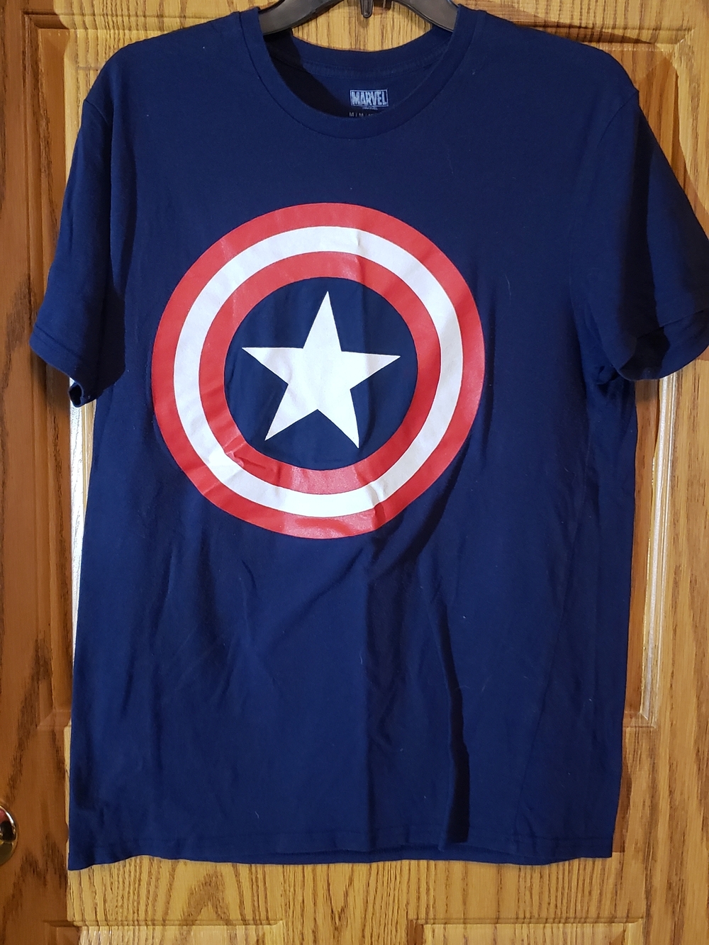 Marvel Navy T‑Shirt with Red and White Captain America Emblem. Medium